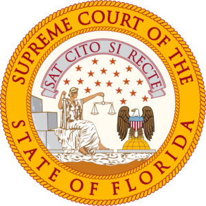 Official seal of the supreme court of the state of Florida, featuring a classical figure holding scales of justice, with a mediator and Latin motto encircled by stars.
